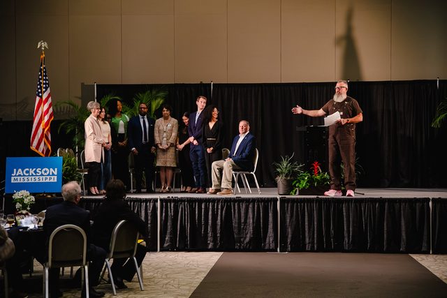 Josh McManus on stage at the Greater Jackson Chamber